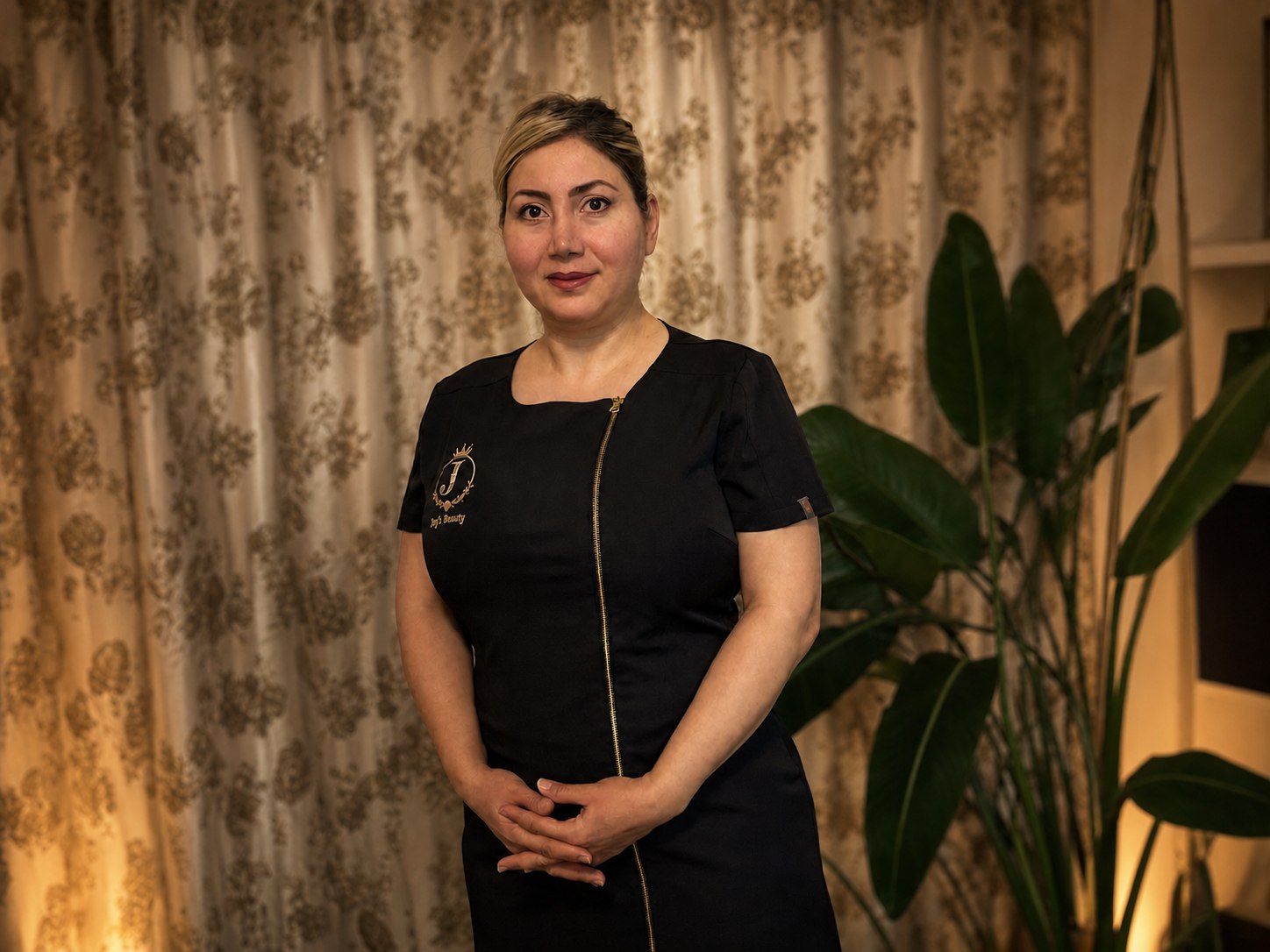 Joy's Beauty aesthetician in clinic uniform